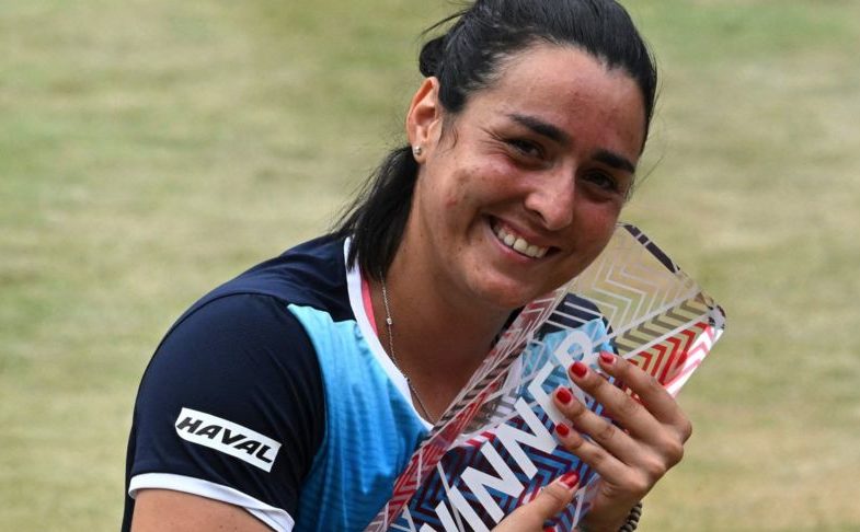 Jabeur smiling with trophy