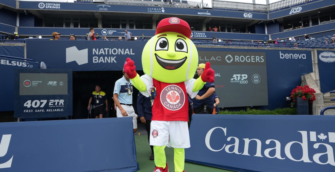 The Tennis Canada Mascot walks out onto Centre Court.