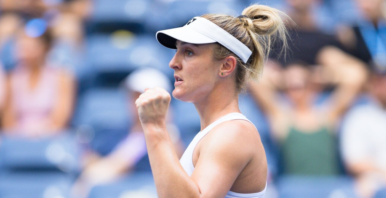 Gabriela Dabrowski pumps her fist.