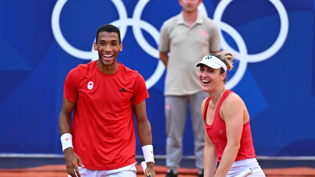 Felix Auger-Aliassime and Gabriela Dabrowski smile during their Olympic bronze medal match.