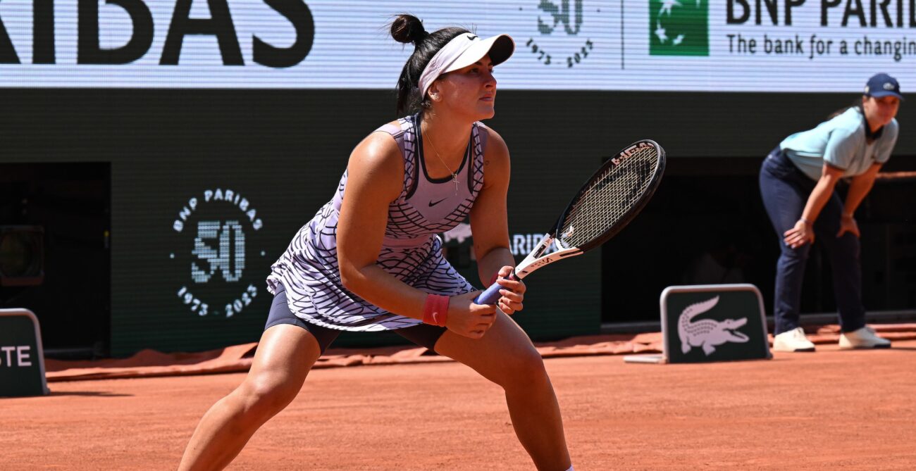 Bianca Andreescu, one of four Canadians remaining in the singles draws at the French Open on Monday, crouches and waits to return serve.