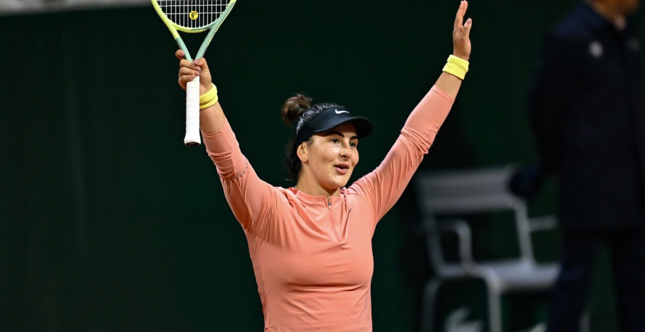 Bianca Andreescu raises her arms over her head in celebration. She was one of four Canadians at Roland-Garros to have a career-best result.