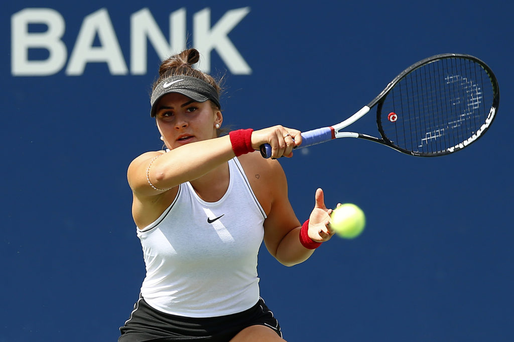 Bianca Andreescu holding tennis racquet