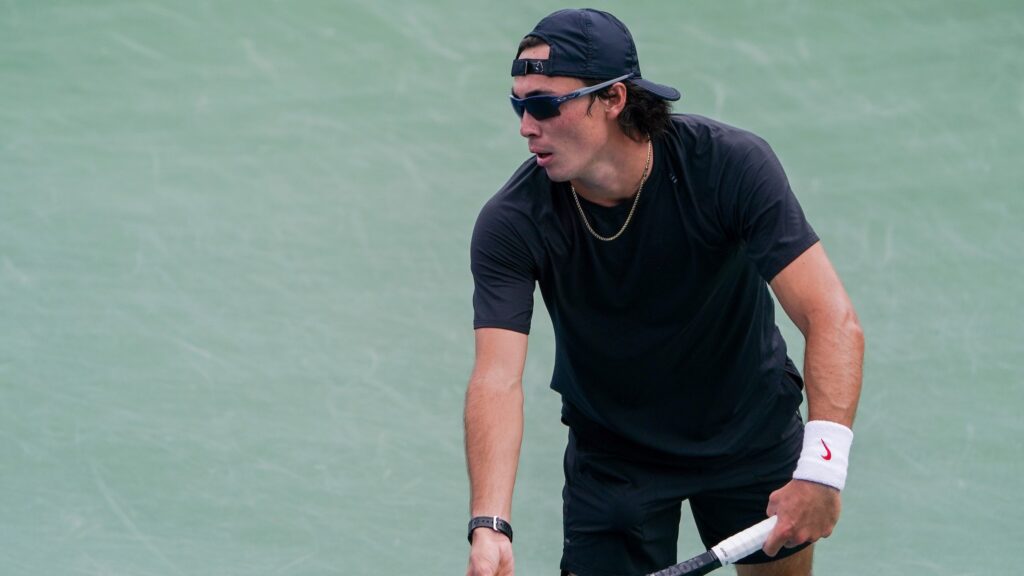 Justin Boulais readying serve