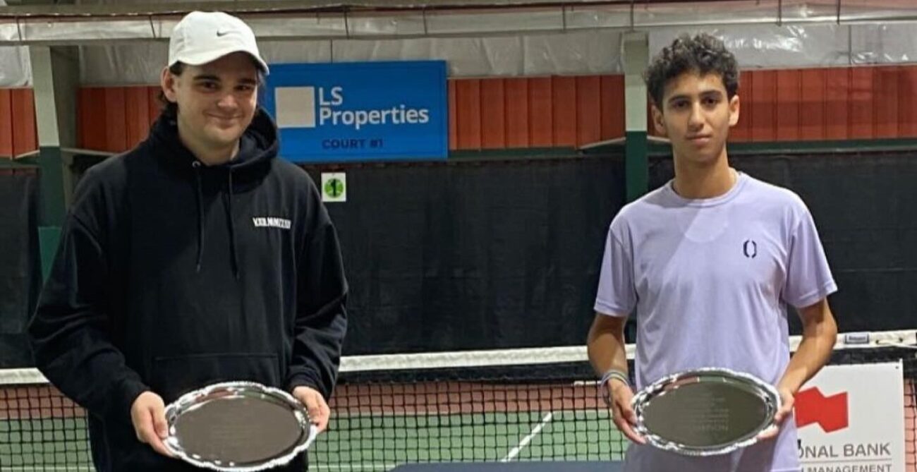 Two Canadians who won ITF Junior titles in Winnipeg hold up their trophies. Canadians also swept the titles in Kamloops.