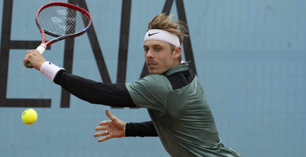 Denis Shapovalov reaches to hit a backhand in Madrid. He lost to Alexander Zverev on Sunday.