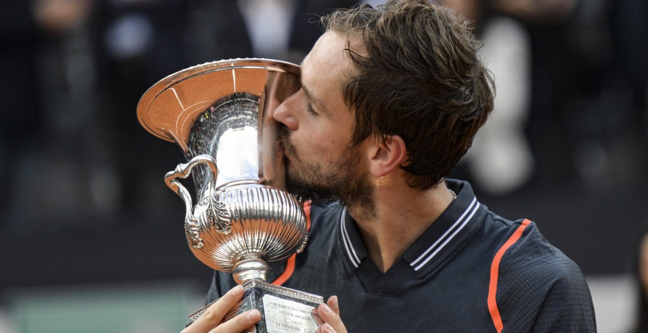 Daniil Medvedev kisses the Rome trophy.