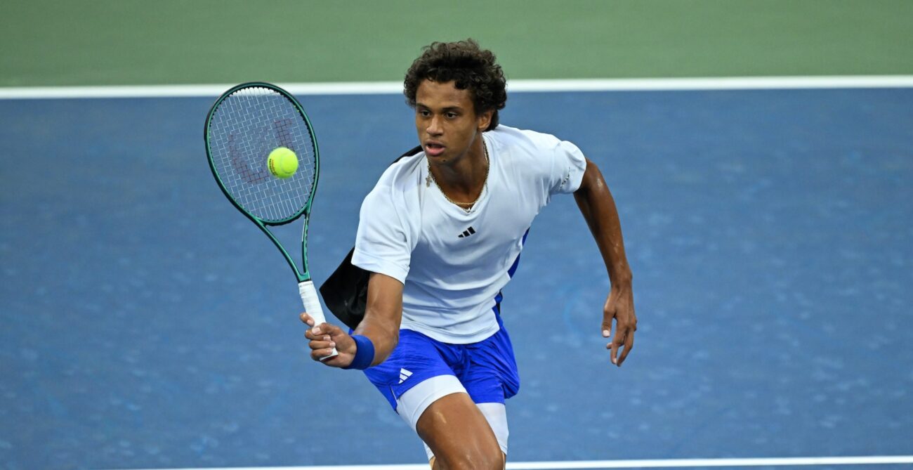 Gabriel Diallo hits a forehand volley. His run at the US Open came to an end in round three against Tommy Paul,