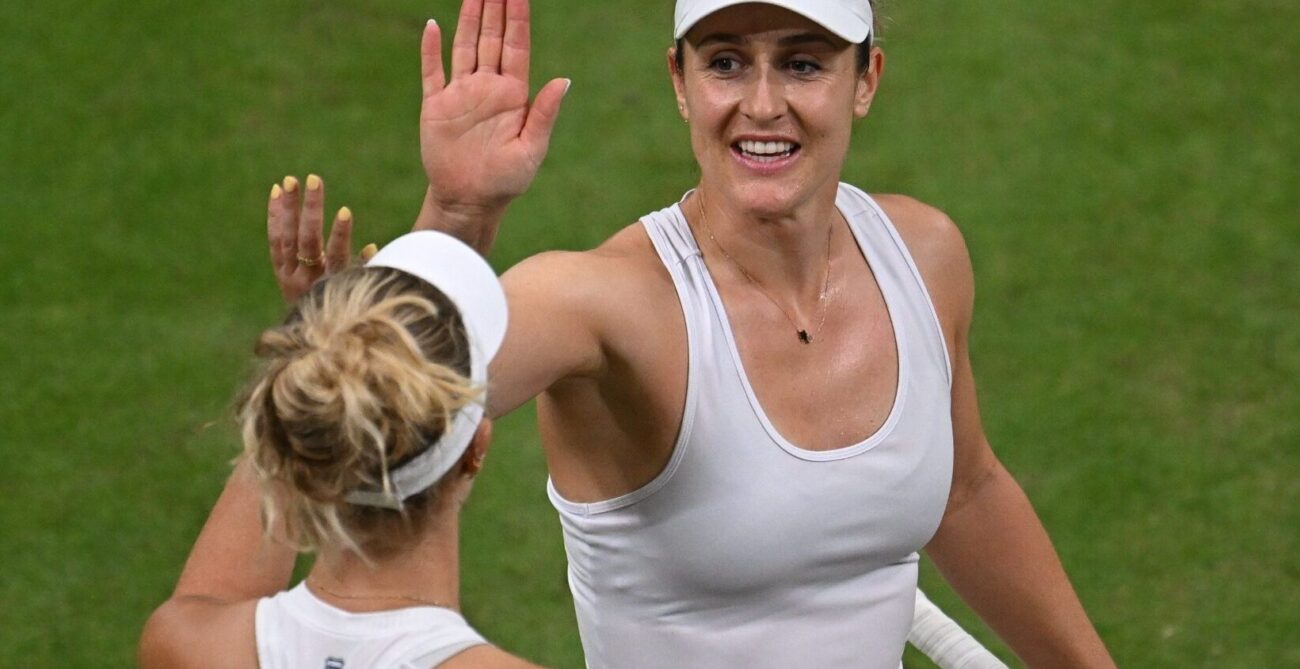 Gaby Dabrowski and Erin Routliffe high fiving