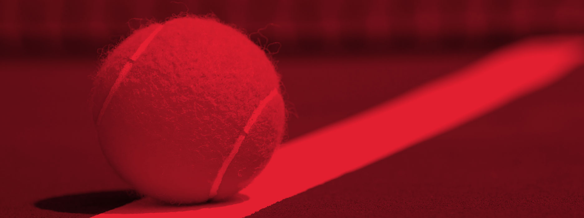 red image of a tennis ball on a court line