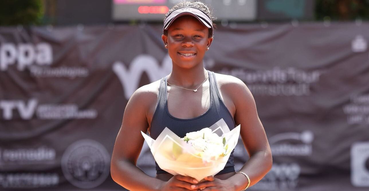 Victoria Mboko holds up her trophy and smiles to the camera. She was one of many Canadians to win last week on the ITF Tour.