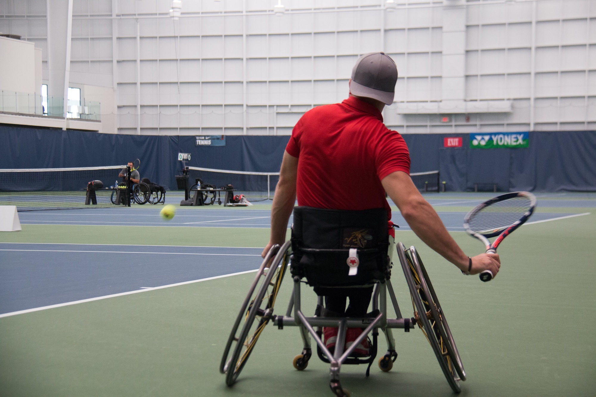 wheelchair player serving