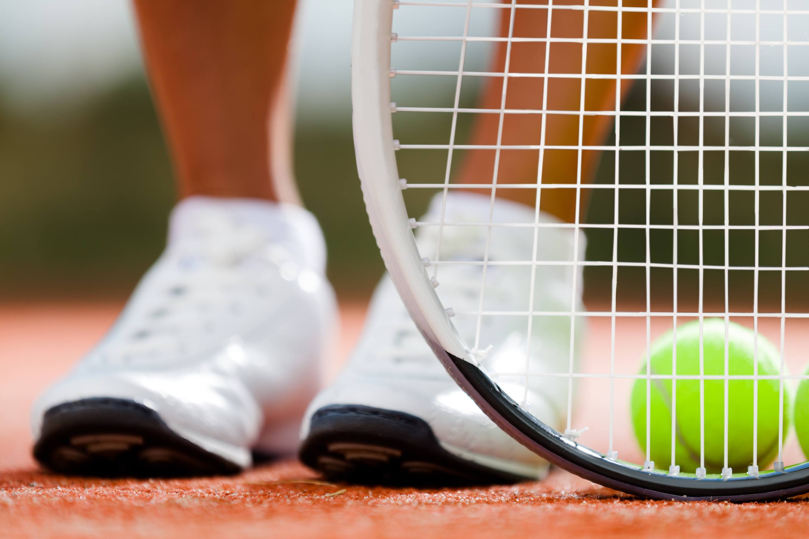 Player holding tennis racket