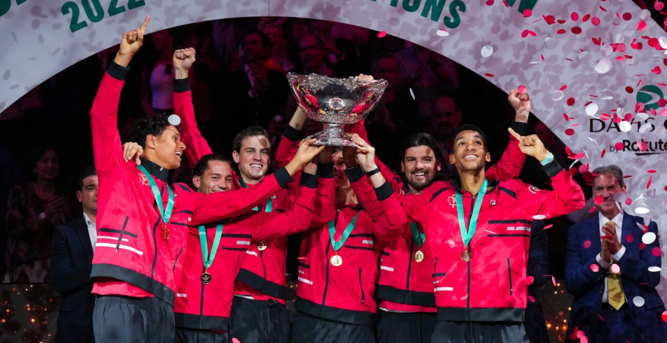 Team Canada lifts the Davis Cup trophy after winning it in 2022.