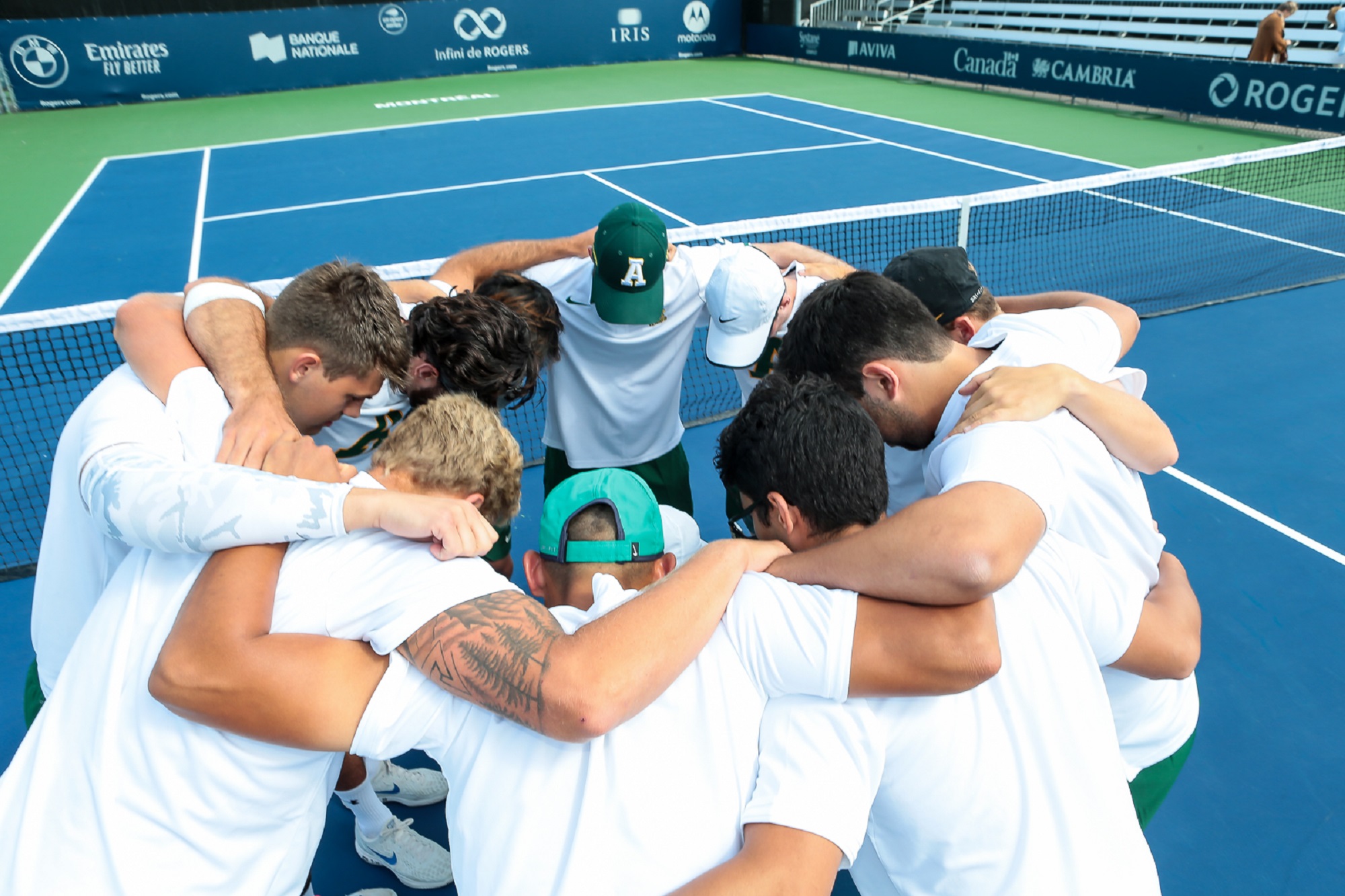 men in huddle