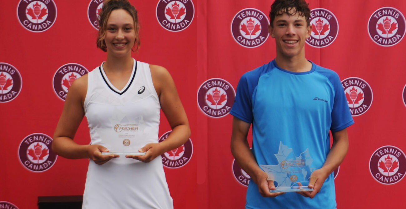 Scarlett Nicholson and Mikael Arseneault pose after winning the U18 Outdoor National Championships