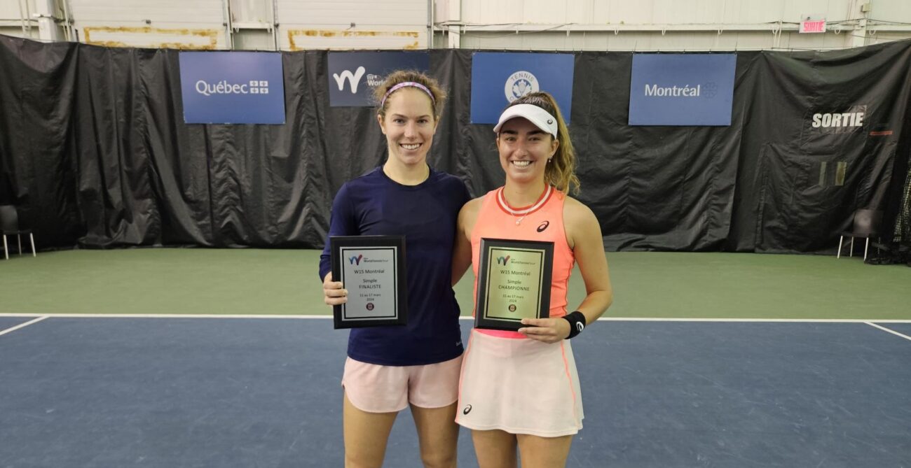 Jessica Failla (right) and Jessie Aney hold up their plaques at the ITF event in Montreal.