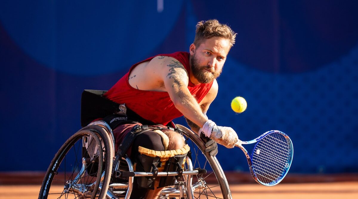 Rob Shaw hits a backhand. He advanced to the quarter-finals of the 2024 Paralympic wheelchair tennis event in Paris.