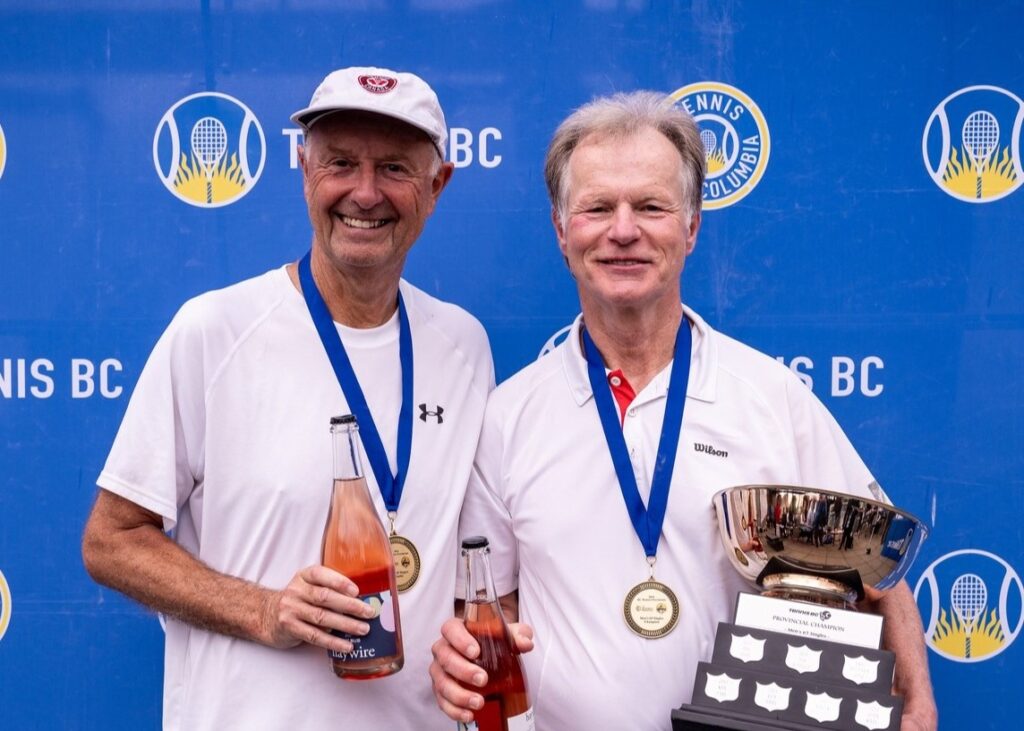 65+ finalists at the Masters event in Vancouver Robert Bettauer (right) and David Fairbotham hold their trophies.