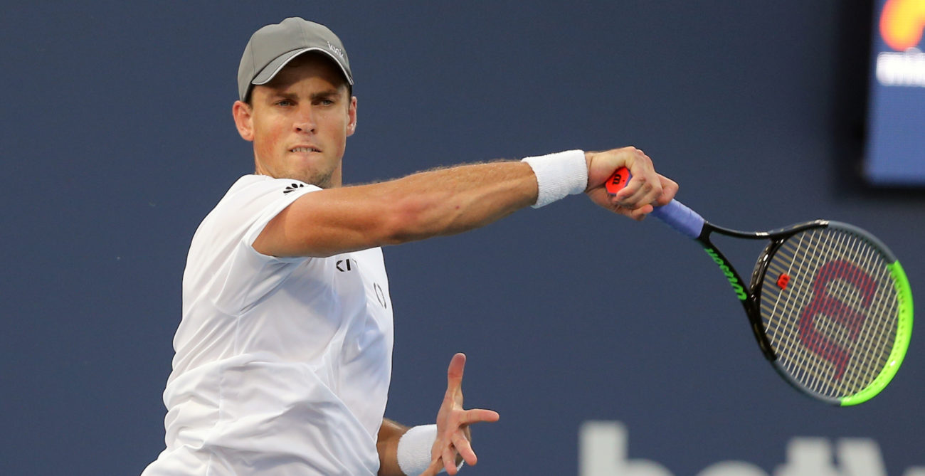 Vasek Pospisil follows through on a forehand.