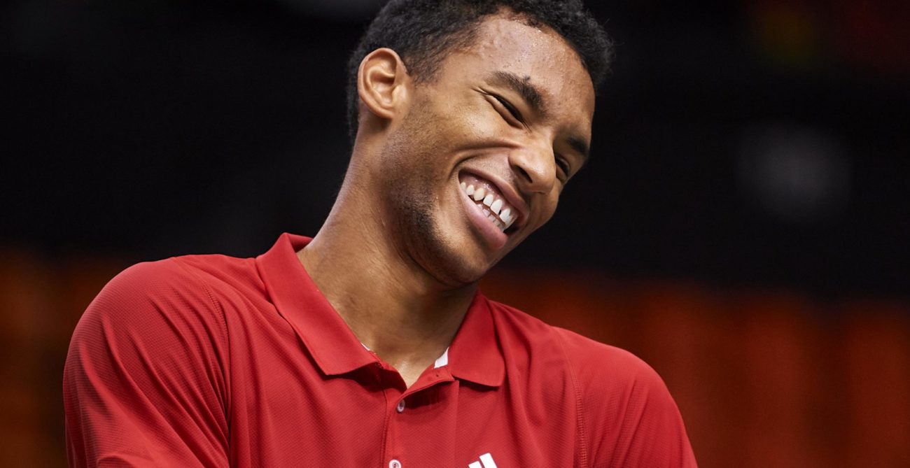 Felix Auger-Aliassime smiles during a practice