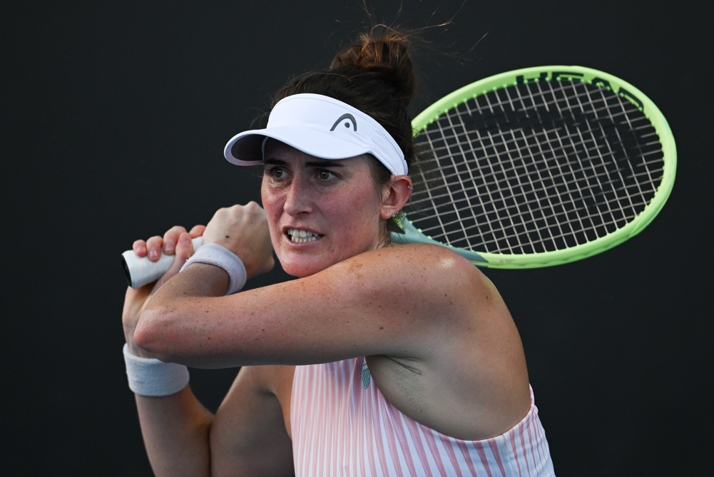 Rebecca Marino follows through on a backhand.